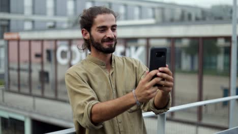 Cheerful-man-during-video-chat